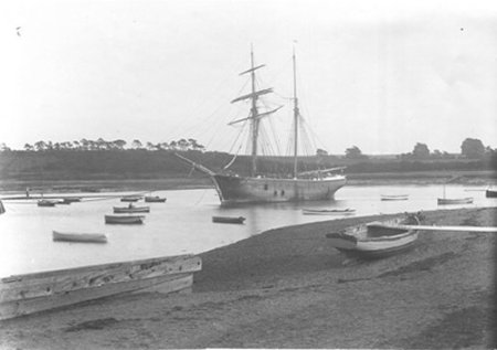 Black and white photo of a topsail schooner at anchor in the Woodbridge Pool.