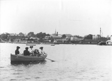 People in boat, rowing