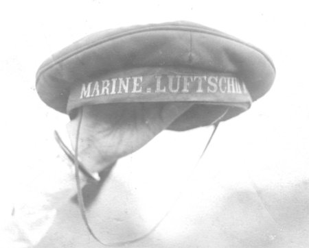 Hat held aloft